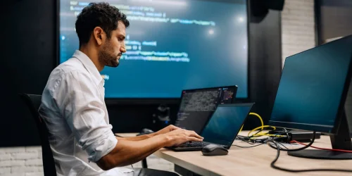 Software Giants Adapt as AI Agents Threaten to Push Industry 'Down the Stack'